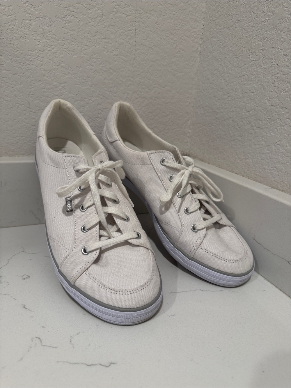 Keds Off-White Canvas Sneakers with Silver Eyelets